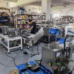 Engineer debugging packaging machine