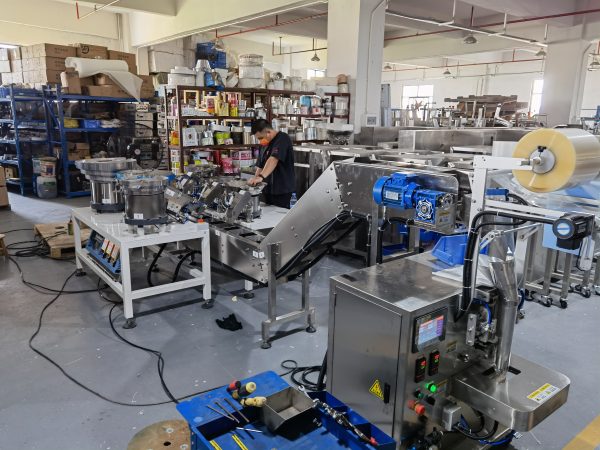 Engineer debugging packaging machine