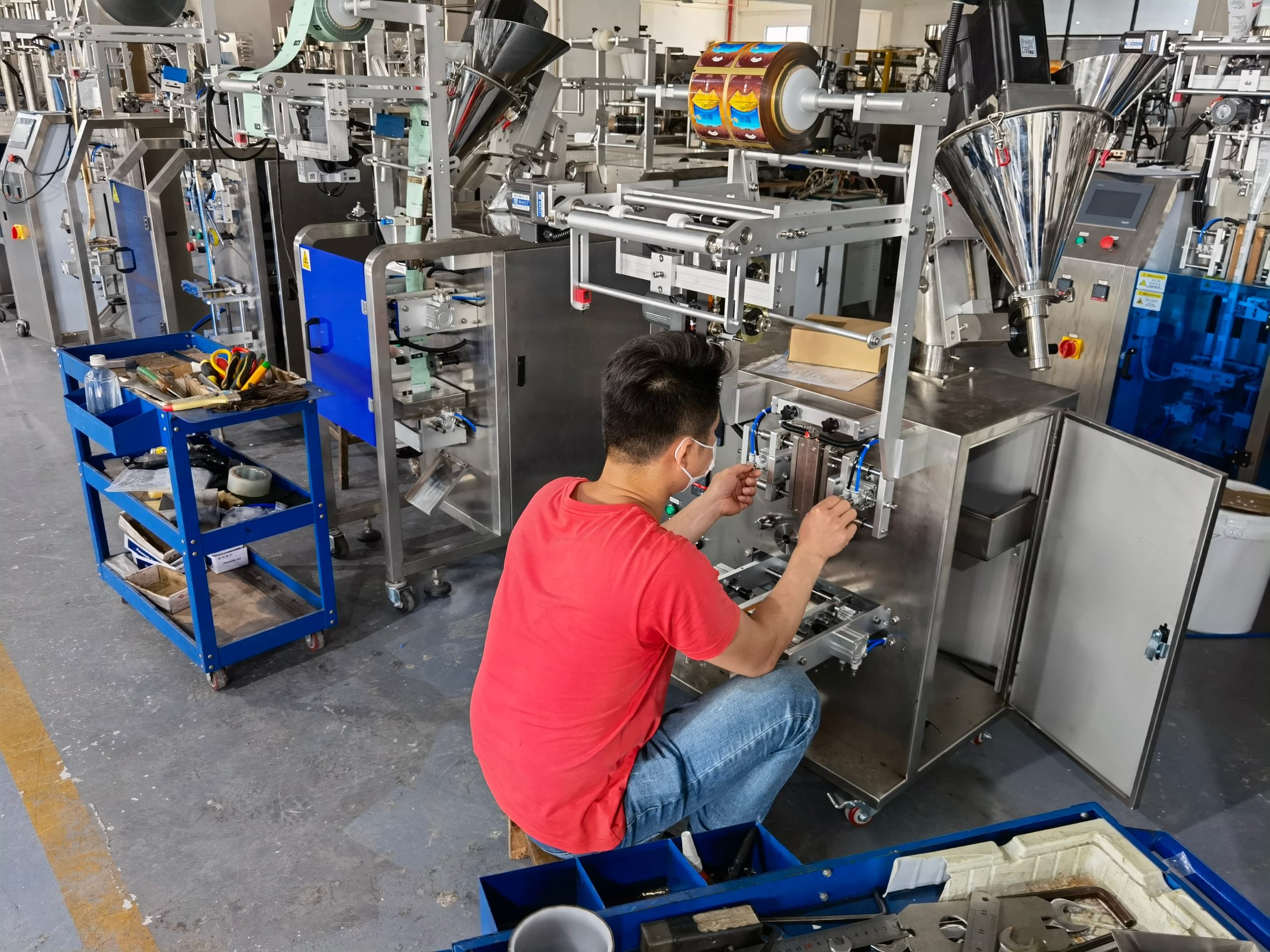 Engineer installing parts