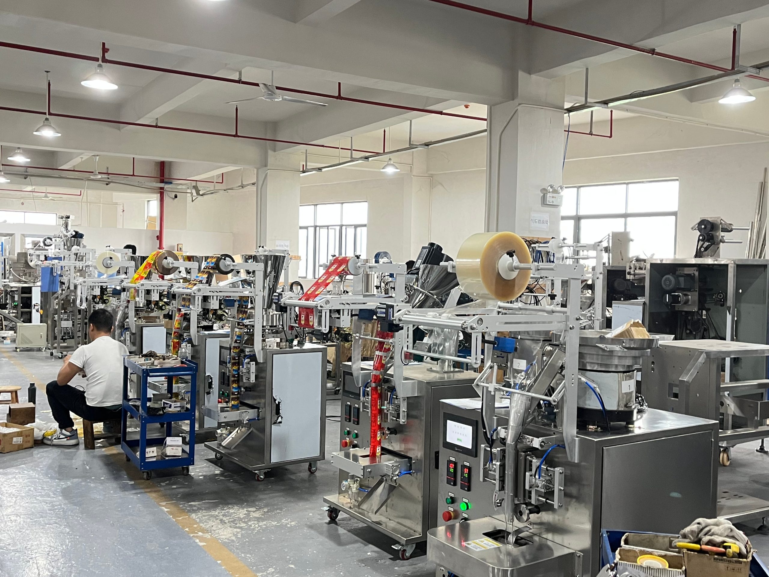 Engineer debugging packaging machine